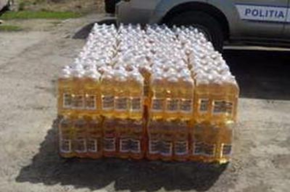 Vin falsificat, descoperit de politisti la o societate din Galati